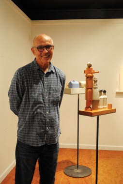 Remarkably, Larry Kornegay spent 35 years playing with the tall carving in "Gary, Booger and the Kids" (foreground) before he felt he had it right. See his work at Modified Arts.
